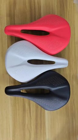 2026 NEW Pu + Carbon Fiber Saddle Road MTB Mountain Bike Bicycle Saddle for Man Cycling Saddle Trail Comfort Races Seat Red Whit