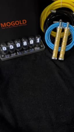 MOGOLD Training Jump Rope: Quick-Change Cord, Anti-Slip Mesh Grip, Durable Metal Handle – Built for Sustained Training