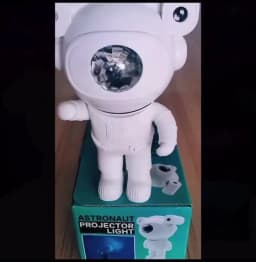 Upgraded Galaxy Night Light Astronaut Starry Nebula Moon Ceiling Sky Projector Light with Timer and Remote Bluetooth Speaker