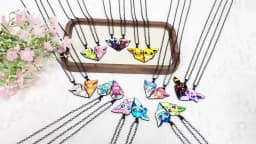 2-piece cute Eevee cartoon pendant necklace with heart patchwork, anime-style metal necklace