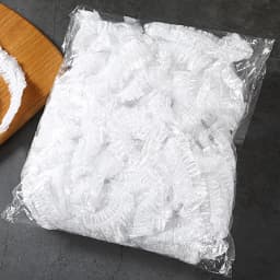100Pcs Disposable Shower Bath Cap Plastic Waterproof Woman Head Hair Cover Bathing Hat Plastic