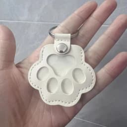 1PC Leather pet hair storage bag, cat paw keychain, multifunctional portable keychain, exquisite bag pendant