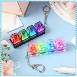 2026 New High-Transparency Four-Button Light-Emitting Stress-Relief Button Keychain Mechanical Keyboard Style Toy Pendant