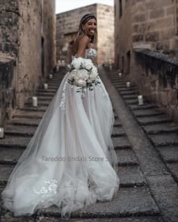 Customized Breathtaking Strapless Wedding Dress Featuring Stunning Crystals Lace Appliques and Flowy Silhouette Bridal Dress