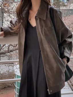Stylish Retro PU Leather Jacket Women's Loose Fit Biker Vest Fashionable Long Sleeve Zipper Closure Doll Collar Commute Style