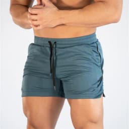 New Muscle Big Size Solid Color Sports Shorts Men's Quick Dry Marathon Running Three Thirds Fitness Beach Pants Quick Dry Mesh