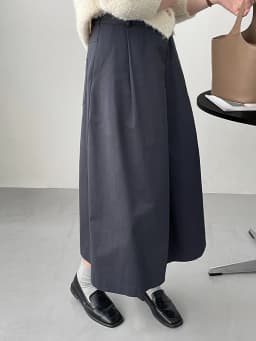 [EAM] High Waist Apricot A-line Irregular Pleated Elegant Half-body Skirt Women Fashion Tide New Spring Autumn 2026 1DH3802