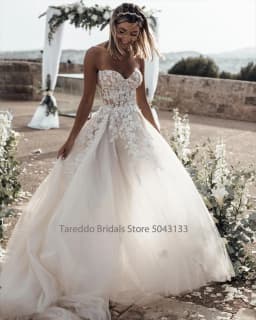 Customized Breathtaking Strapless Wedding Dress Featuring Stunning Crystals Lace Appliques and Flowy Silhouette Bridal Dress