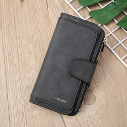 Featuring a cat motif this women's long wallet offers multiple card slots a coin pocket and a cell phone pouch A perfect gift