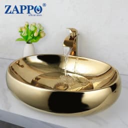 ZAPPO 23 Inch Bathroom Vessel Sink Gold Ceramic Sink Bowl Above Counter Oval Bathroom Sink with Waterfall Faucet Drain Combo