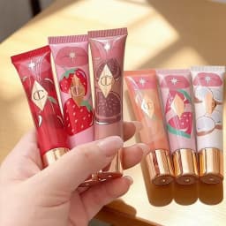 Luxury CT Multicolored Water Light Lip Gloss Lasting Moisturizing Lip Balm Heart-shaped Tip Lip Brush and Jelly Lip Gloss Makeup