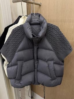 Janveny 2026 New Winter Turtleneck White Duck Down Vest Women Patchwork Knitted Warm Drawstring Short Soft Puffer Down Waistcoat