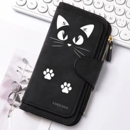 Featuring a cat motif this women's long wallet offers multiple card slots a coin pocket and a cell phone pouch A perfect gift