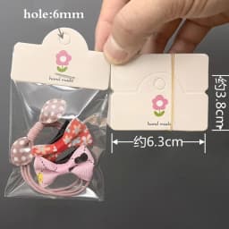 50pcs/lot Foldable Packaging Paper Cards with OPP Bags for Handmade Jewelry Retail Hang Tag Bow-knot Pattern Display Cardboard