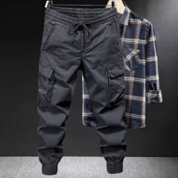 Male Drawstring Elastic Waist Cargo Jogger Pants Loose Multi‑Pocket Solid Color Trousers Outdoor Casual Long Pants Spring Autumn