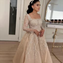 Customized Luxury Princess Crystal Beaded Boat Neck Long Sleeves Ball Gown Wedding Dresses 2026 Backless Court Train Bridal Gown