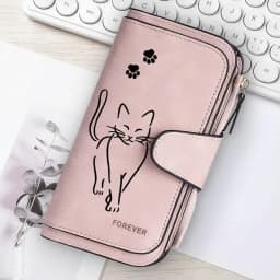 Featuring a cat motif this women's long wallet offers multiple card slots a coin pocket and a cell phone pouch A perfect gift