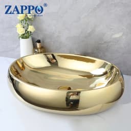 ZAPPO 23 Inch Bathroom Vessel Sink Gold Ceramic Sink Bowl Above Counter Oval Bathroom Sink with Waterfall Faucet Drain Combo