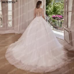 BEPEITHY Customized A Line Glitter Full Sleeves Wedding Dresses 2026 O Neck Court Train Illusion Bride Ivory Beading Bridal Gown