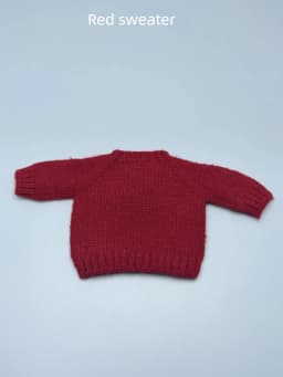 For the Zsiga doll dress it features a stylish pair of sunglasses a pink sweater and a cute design reminiscent of a grandma.