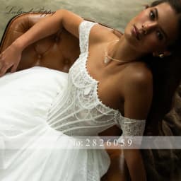 Lceland Poppy Customized A Line Boat Neck Lace Wedding Dresses Floor Length Illusion Beaded Bridal Gowns with Court Train