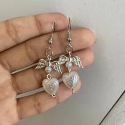 white coquette pearl angel earrings