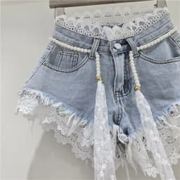 2026 Summer Denim Shorts New Splicing Hook Flower Lace Lace with Waist Rope Tassel Denim Shorts Women's Hot Pants Trend