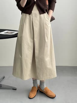 [EAM] High Waist Apricot A-line Irregular Pleated Elegant Half-body Skirt Women Fashion Tide New Spring Autumn 2026 1DH3802