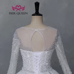 Customized Sheer Neck Long Sleeves Wedding Dress 2026 New Fashion Pearls And Crystal Beaded Luxury Wedding Dress Bride WX0467