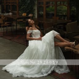 Lceland Poppy Customized A Line Boat Neck Lace Wedding Dresses Floor Length Illusion Beaded Bridal Gowns with Court Train