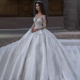 Customized New Luxurious Crystal Sequin Beaded Ball Gown Satin Wedding Dress Illusion Long Sleeves 2026 Court Train Bridal Gowns