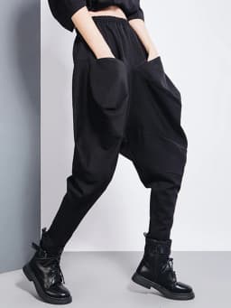 [EAM] Big Pockets Spliced Irregular High Waist Harem Trousers New Loose Fit Pants Women Fashion Tide Spring Autumn 2026 1DD2684