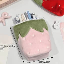 Japanese vintage-style strawberry vertical pencil case, made of soft plush material, available in pink and red colors. The vertical design is stable and won't tip over. It has a large capacity to store stationery, mobile phones, cosmetics, journal materials, and CCD card cameras. It is shockproof, scratch-resistant, portable, and multi-purpose. Sweet, cute, and practical, it is suitable for daily study, office work, and travel