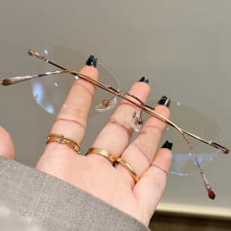 YIMARUILI Ultralight Fashion Cat Eye Rimless Glasses Women Retro Titanium Alloy Retouch Face Optical Prescription Framework 690A