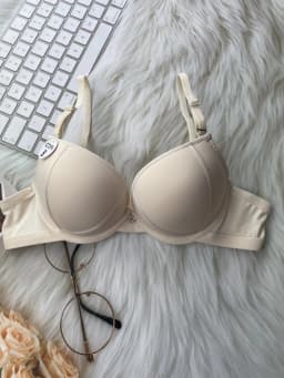Sexy girl gathered up to support small breasts to show big bra thin bottom thick B cup underwear lady