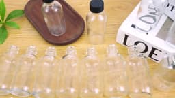 2oz Small Clear Glass Bottles with Lids for Liquids, Tiny Short Jars with Caps Mini Glass Juice Bottles for Potion, Ginger Shots