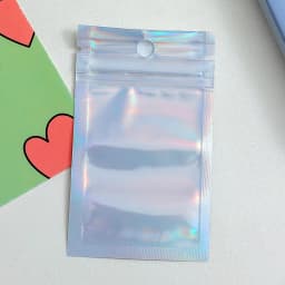 50 Pieces Cute Laser Self Sealing Little Small Plastic Bags for Jewelry Display Bags Pouch and Packaging Organizer Storage Bag