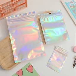 50 Pieces Cute Laser Self Sealing Little Small Plastic Bags for Jewelry Display Bags Pouch and Packaging Organizer Storage Bag