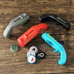 Portable Creative Pistol Bottle Cap Launcher Beer Opener Shooting Cap Gun Multifunctional Home Kitchen Bar Gadget Funny Gift