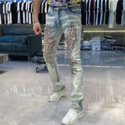 New Splicing Ripped Jeans Men's Rivet Decoration Mens Jeans Brand 2026 Fashion Trendy Versatile Long Pants Jeans Masculina