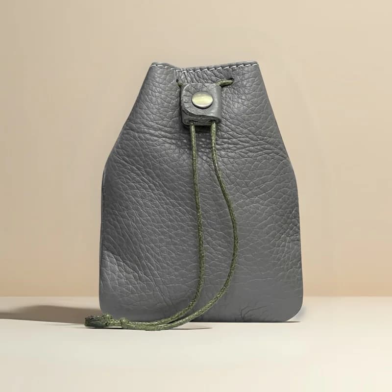 New Cow Leather Women's and Men's Drawstring Change Vintage Coin Bag Headphone Strap Purse Storage Bag For Man And Woman