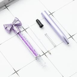 10Pcs/Lot Cute Bow Knot Ballpoint Pens Bow-tie Rotating Crystal Writing Gel Pen Black Blue Ink Office Supplies School Stationery