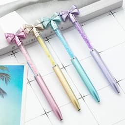 10Pcs/Lot Cute Bow Knot Ballpoint Pens Bow-tie Rotating Crystal Writing Gel Pen Black Blue Ink Office Supplies School Stationery