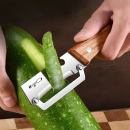 1pcs Stainless steel peeler with wooden handle for peeling and slicing fruits and vegetables | Durable and smooth operation