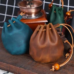 AIGUONIU Original Handmade Genuine Leather Unisex Coin Purse Cow Leather Coins Money Pocket Retro Wallet Drawstring Storage Bag