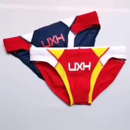2026 warehouse real shot men's fashion stitching briefs Japanese show beach swimming trunks close-fitting briefs UXH026