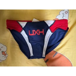 2026 warehouse real shot men's fashion stitching briefs Japanese show beach swimming trunks close-fitting briefs UXH026