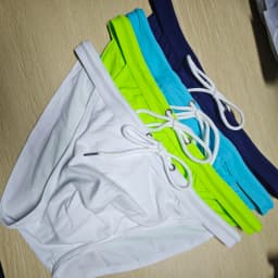 2026New s slender waist men's swimming trunks foreign trade triangle swimsuit European and American new fashion D101