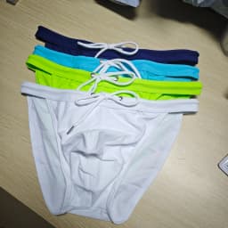 2026New s slender waist men's swimming trunks foreign trade triangle swimsuit European and American new fashion D101