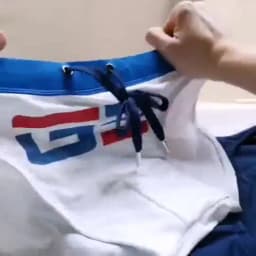 Men's color matching printed triangle swimming trunks fashion catwalk beach triangle swimming trunks hot spring pants men UXHG3